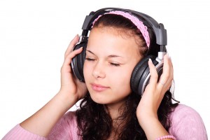 11704-a-beautiful-girl-listening-to-music-with-headphones-pv